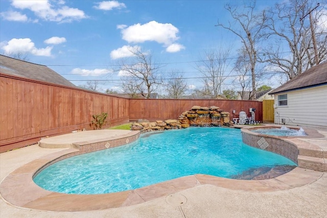 view of pool with a fenced in pool, a patio, an in ground hot tub, and a fenced backyard