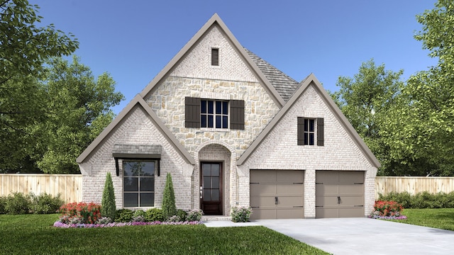 french provincial home featuring brick siding, concrete driveway, and fence