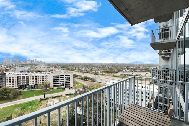 balcony featuring a city view