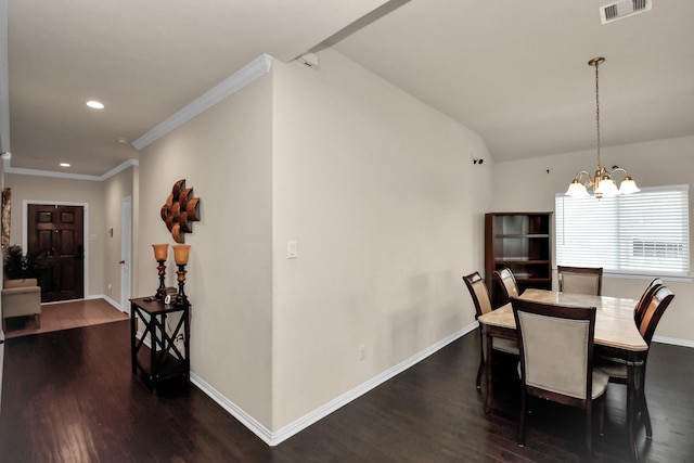 dining area featuring visible vents, dark wood-type flooring, recessed lighting, baseboards, and a chandelier