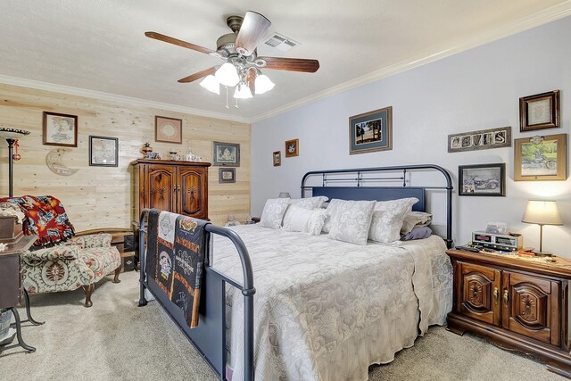 bedroom featuring visible vents, light colored carpet, a ceiling fan, and ornamental molding