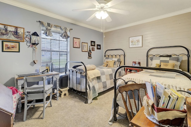 bedroom featuring crown molding, carpet floors, and ceiling fan