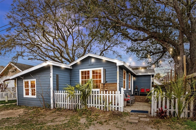 view of front of property with a fenced front yard