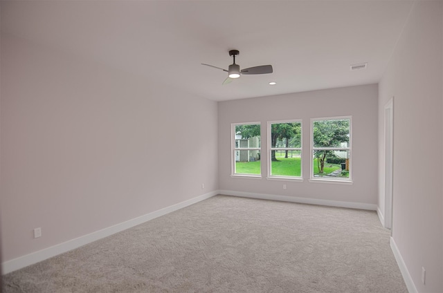 unfurnished room featuring visible vents, baseboards, ceiling fan, light colored carpet, and recessed lighting