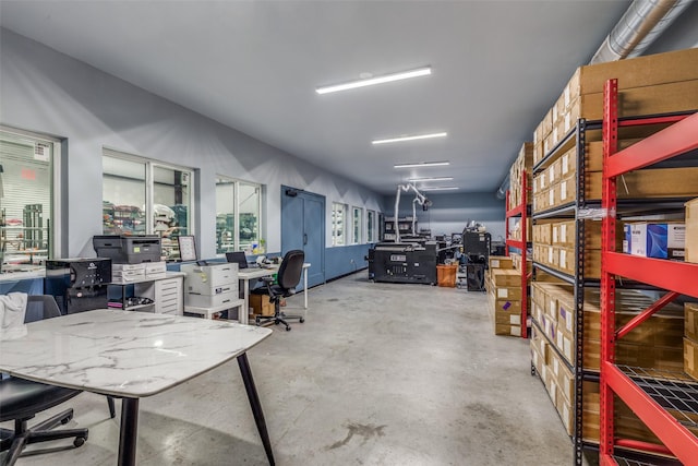 10711 Hidden Lake Ln, Richmond, TX 77406 - garage featuring an office area