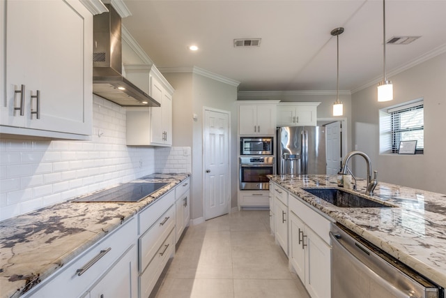 10711 Hidden Lake Ln, Richmond, TX 77406 - kitchen with wall chimney exhaust hood, stainless steel appliances, a sink, white cabinets, and crown molding