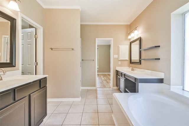 18 Valley Mead Pl, Conroe, TX 77384 - bathroom featuring two vanities, a garden tub, crown molding, and tile patterned flooring