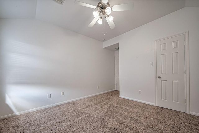 carpeted empty room featuring baseboards and a ceiling fan