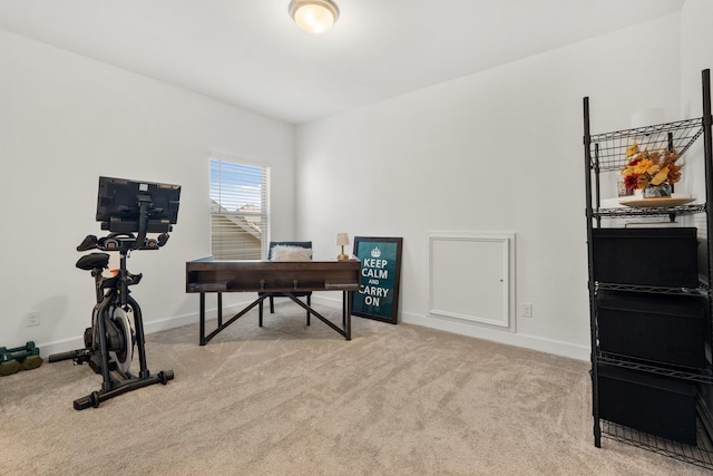 carpeted office with baseboards