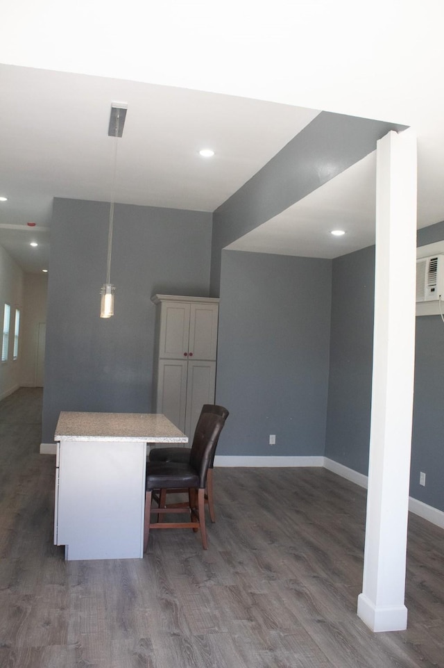 interior space with recessed lighting, baseboards, and wood finished floors