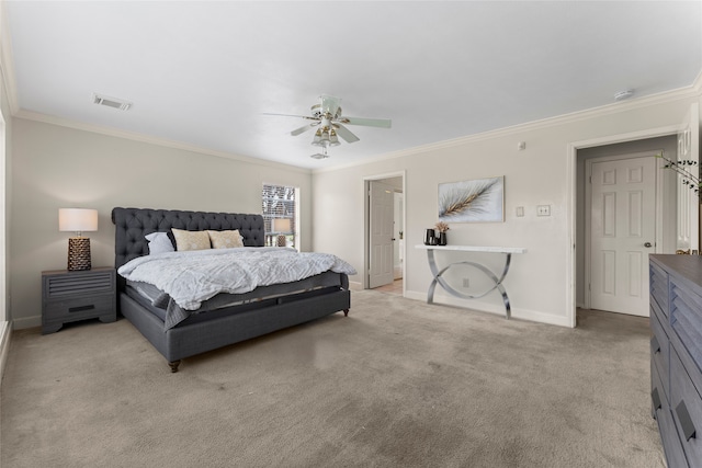 bedroom with visible vents, crown molding, baseboards, light carpet, and a ceiling fan