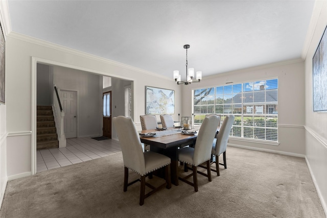 carpeted dining room with an inviting chandelier, ornamental molding, and stairs