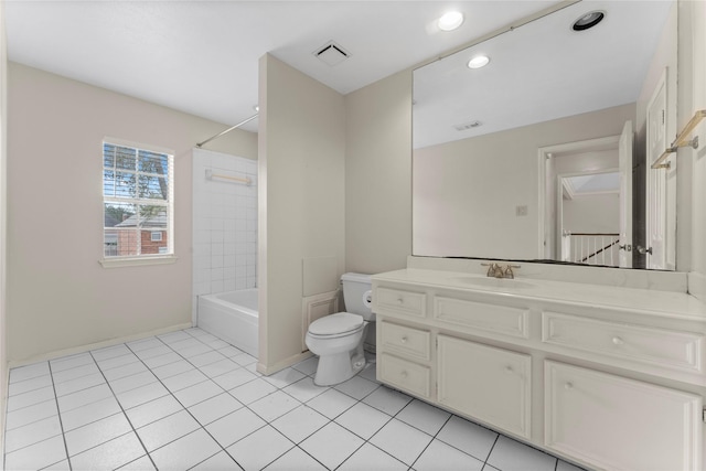 bathroom featuring tile patterned floors, visible vents, toilet, vanity, and shower / bathtub combination