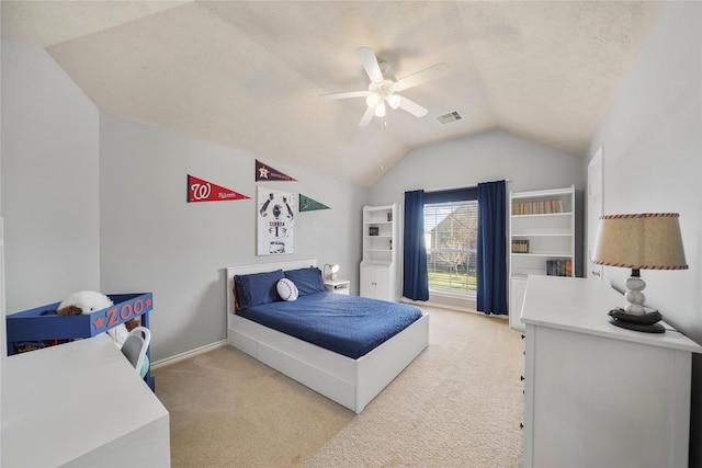 bedroom featuring baseboards, visible vents, lofted ceiling, ceiling fan, and light colored carpet