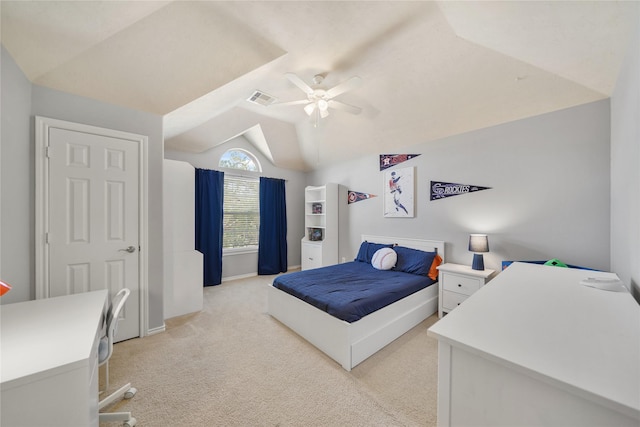 bedroom featuring visible vents, baseboards, ceiling fan, vaulted ceiling, and light carpet