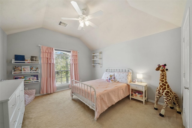 bedroom with visible vents, baseboards, vaulted ceiling, light carpet, and a ceiling fan