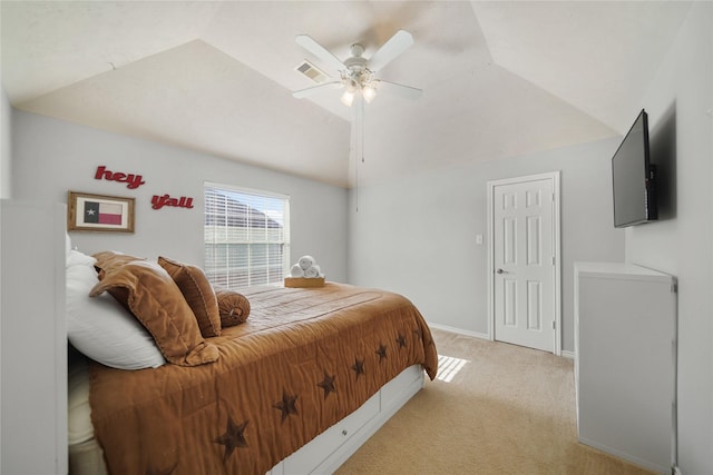 bedroom featuring visible vents, baseboards, light colored carpet, vaulted ceiling, and a ceiling fan