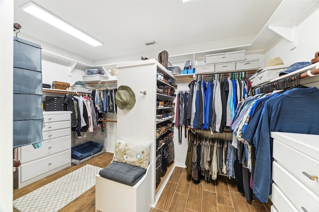 spacious closet featuring visible vents and wood tiled floor