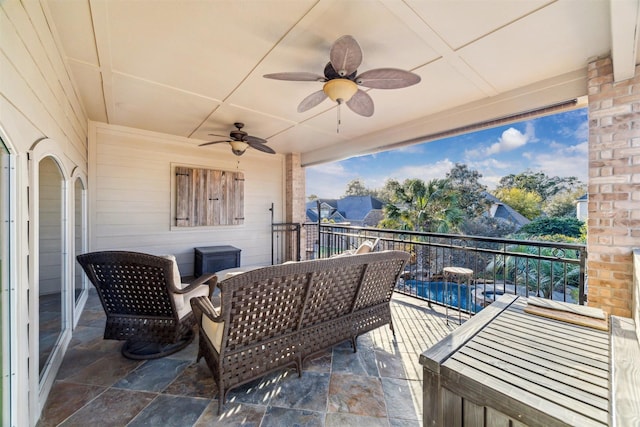 balcony with a ceiling fan