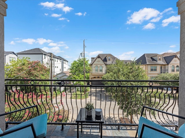 balcony featuring a residential view