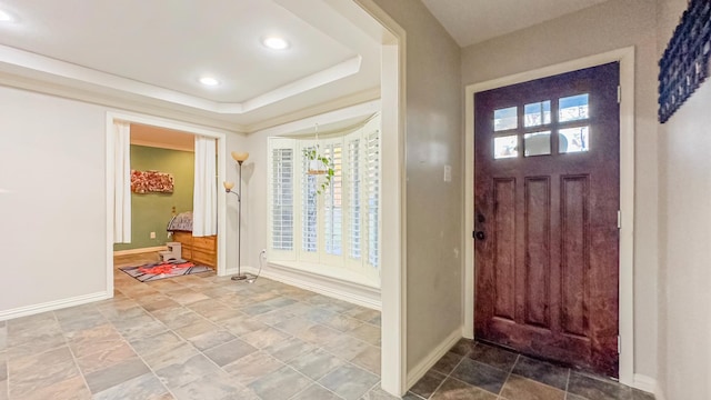 17866 Magnolia Ln, New Caney, TX 77357 - entryway with plenty of natural light, baseboards, recessed lighting, and stone finish floors