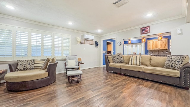 17866 Magnolia Ln, New Caney, TX 77357 - living area featuring an AC wall unit, wood finished floors, crown molding, recessed lighting, and baseboards