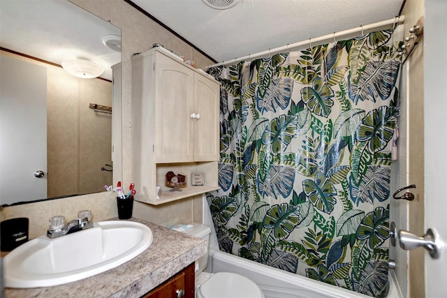 full bathroom with shower / bath combination with curtain, toilet, a textured ceiling, and vanity