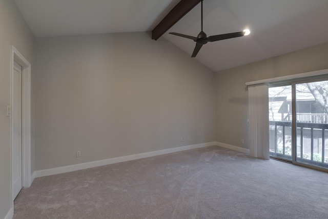 spare room featuring a ceiling fan, vaulted ceiling with beams, light colored carpet, and baseboards