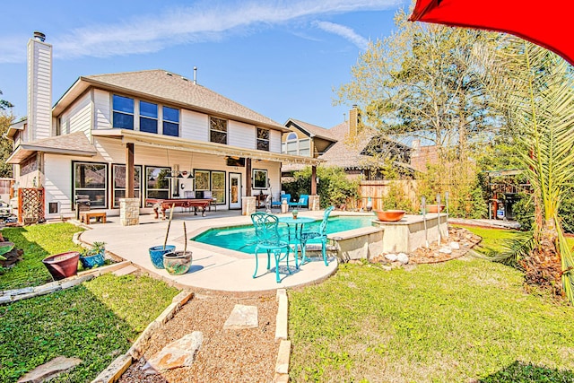 view of pool featuring a fenced in pool, a lawn, a patio, and fence