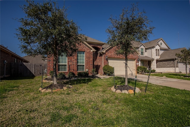 view of front of property featuring a front lawn, fence, brick siding, and driveway