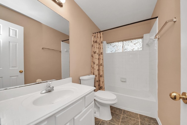 bathroom featuring tile patterned floors, shower / tub combo, toilet, and vanity