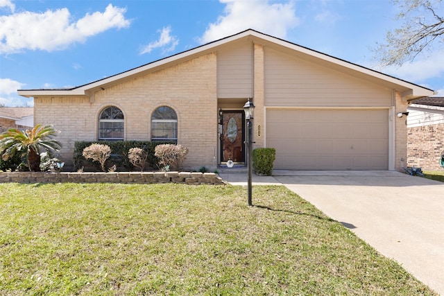 view of front of property featuring a garage, a front yard, brick siding, and driveway