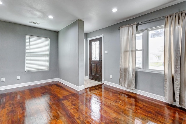 foyer featuring recessed lighting, baseboards, and hardwood / wood-style flooring