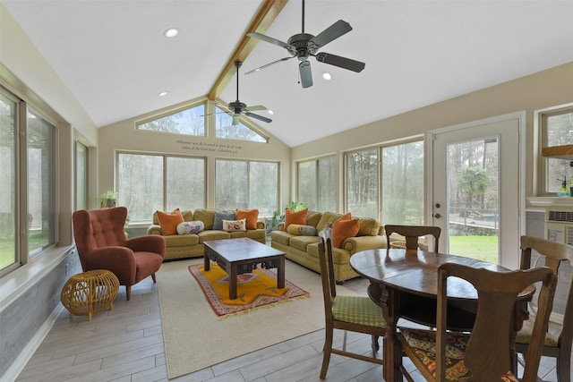 sunroom / solarium with vaulted ceiling with beams