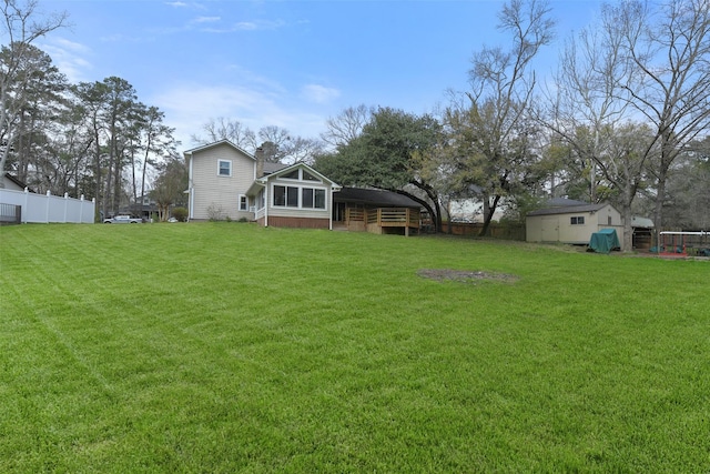 view of yard with fence