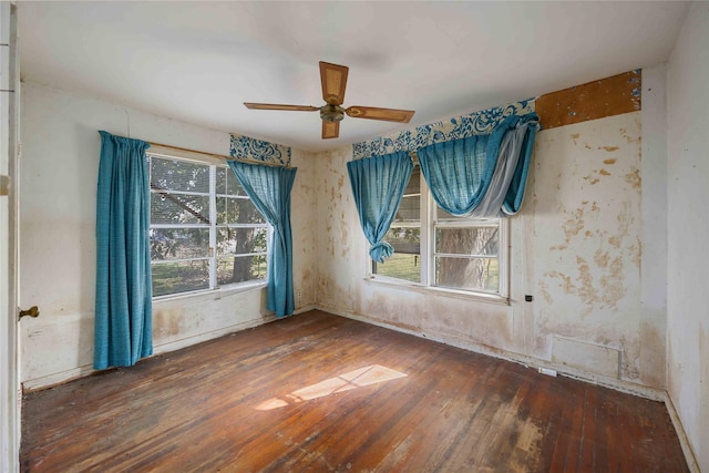 unfurnished room featuring ceiling fan and hardwood / wood-style flooring