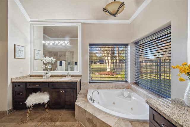 bathroom featuring a stall shower, vanity, crown molding, and a whirlpool tub