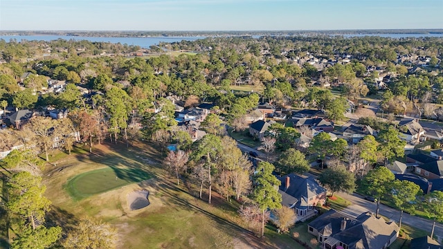 bird's eye view featuring a residential view and a water view