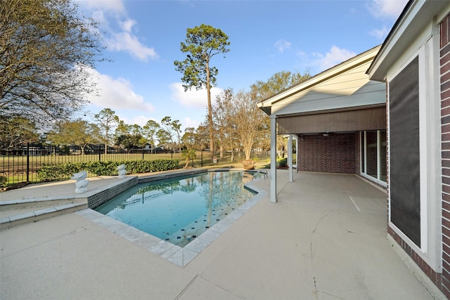 view of pool featuring a patio, a fenced backyard, and a fenced in pool