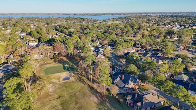 birds eye view of property featuring a water view and a residential view