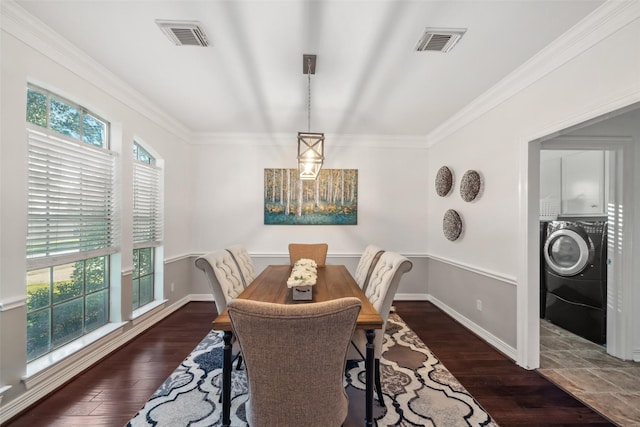 dining space with visible vents, wood finished floors, and ornamental molding