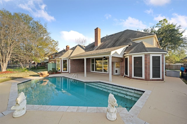 view of swimming pool featuring a fenced in pool, a patio, and fence