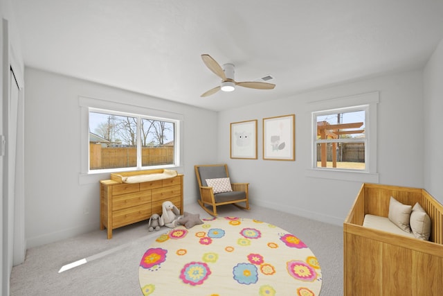 bedroom with baseboards, carpet, and ceiling fan