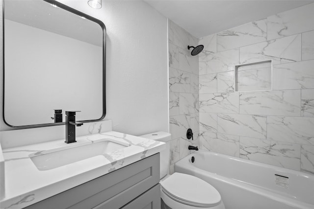 full bathroom with vanity, toilet, a textured wall, and shower / washtub combination