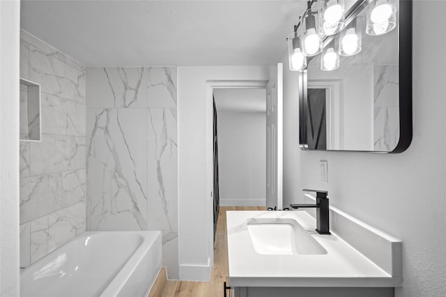 full bath with vanity and wood finished floors