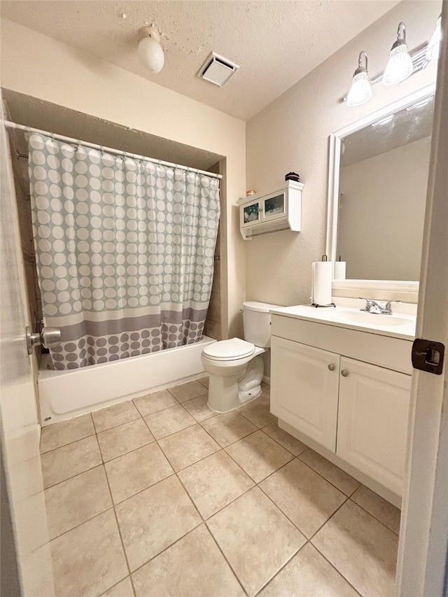 bathroom with visible vents, shower / tub combo, a textured ceiling, tile patterned floors, and toilet