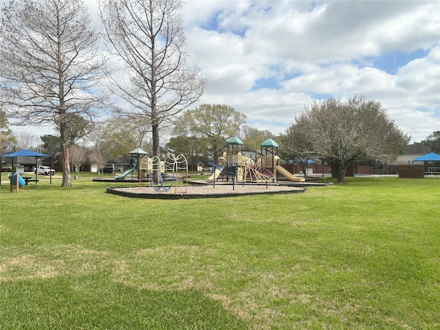 community play area with a lawn