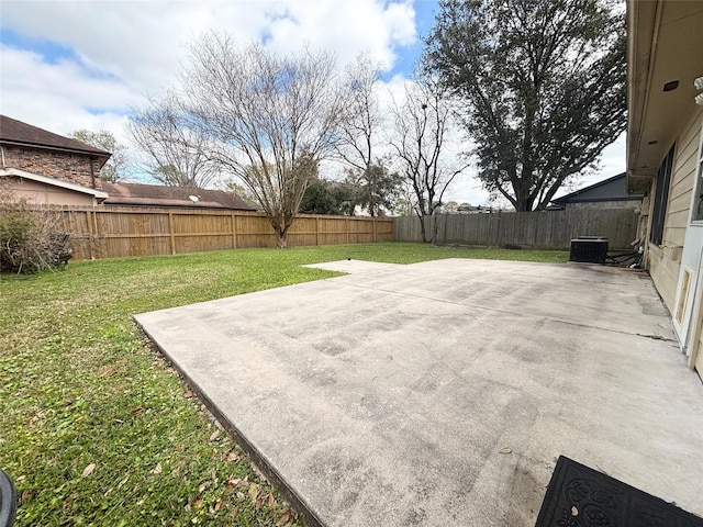 exterior space with a patio area, central air condition unit, and a fenced backyard