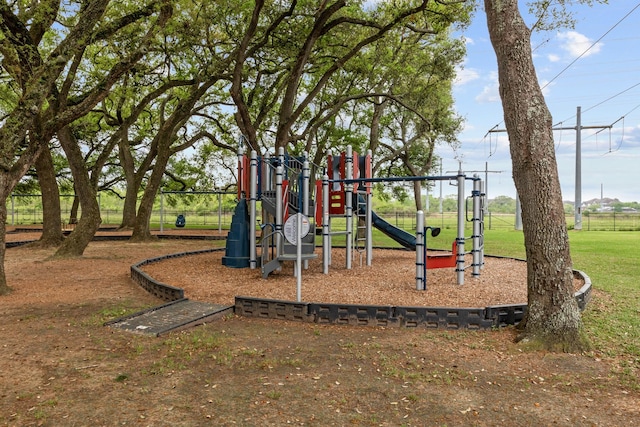 communal playground with a lawn