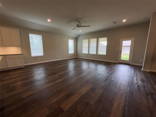 unfurnished living room featuring dark wood-style floors, recessed lighting, baseboards, and ceiling fan